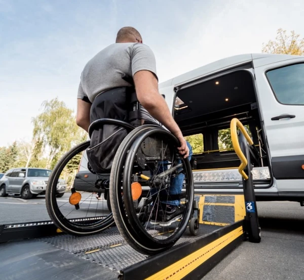 Wheelchair on a ramp into car